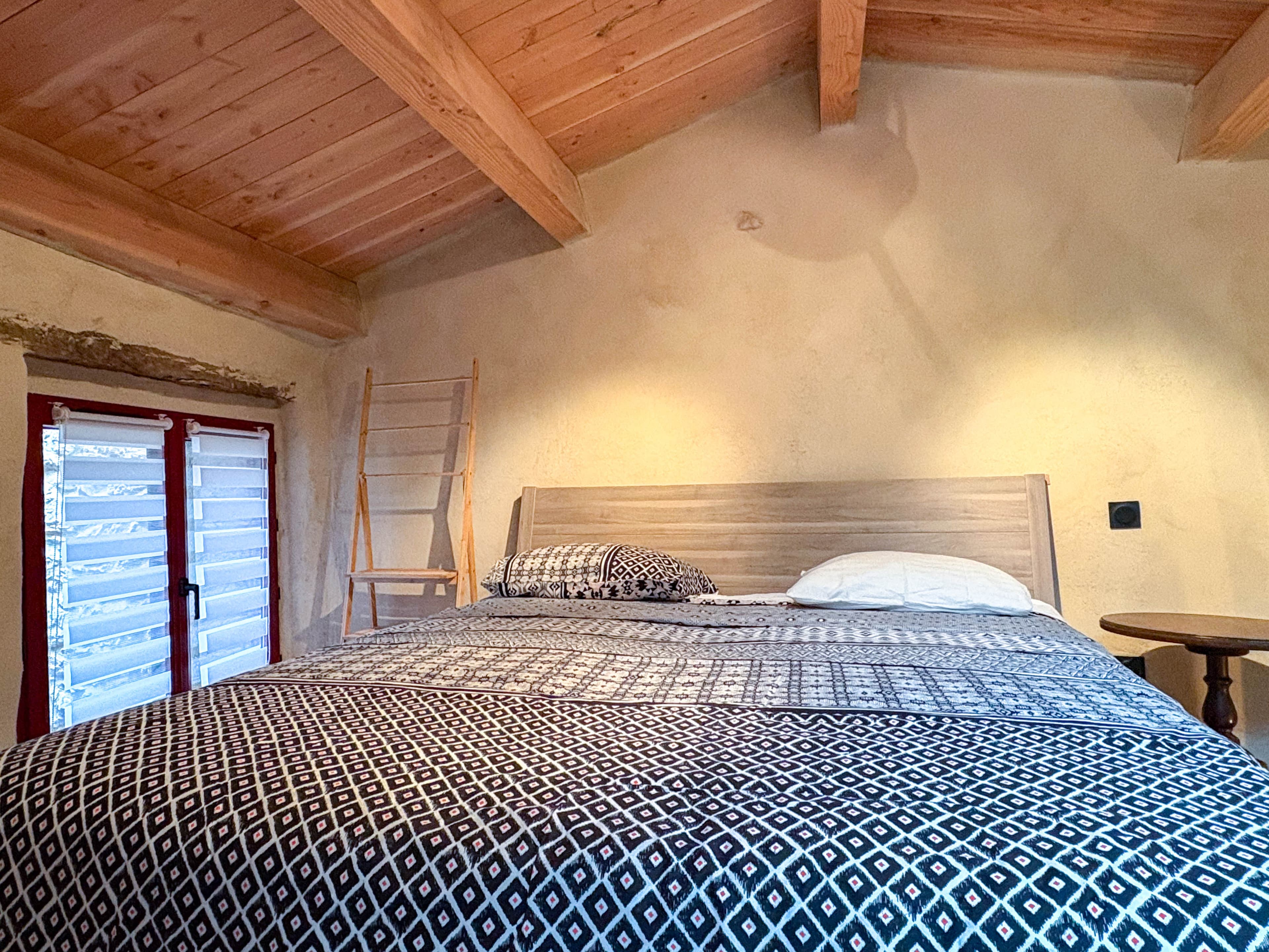 Bebop Studio bedroom with French doors