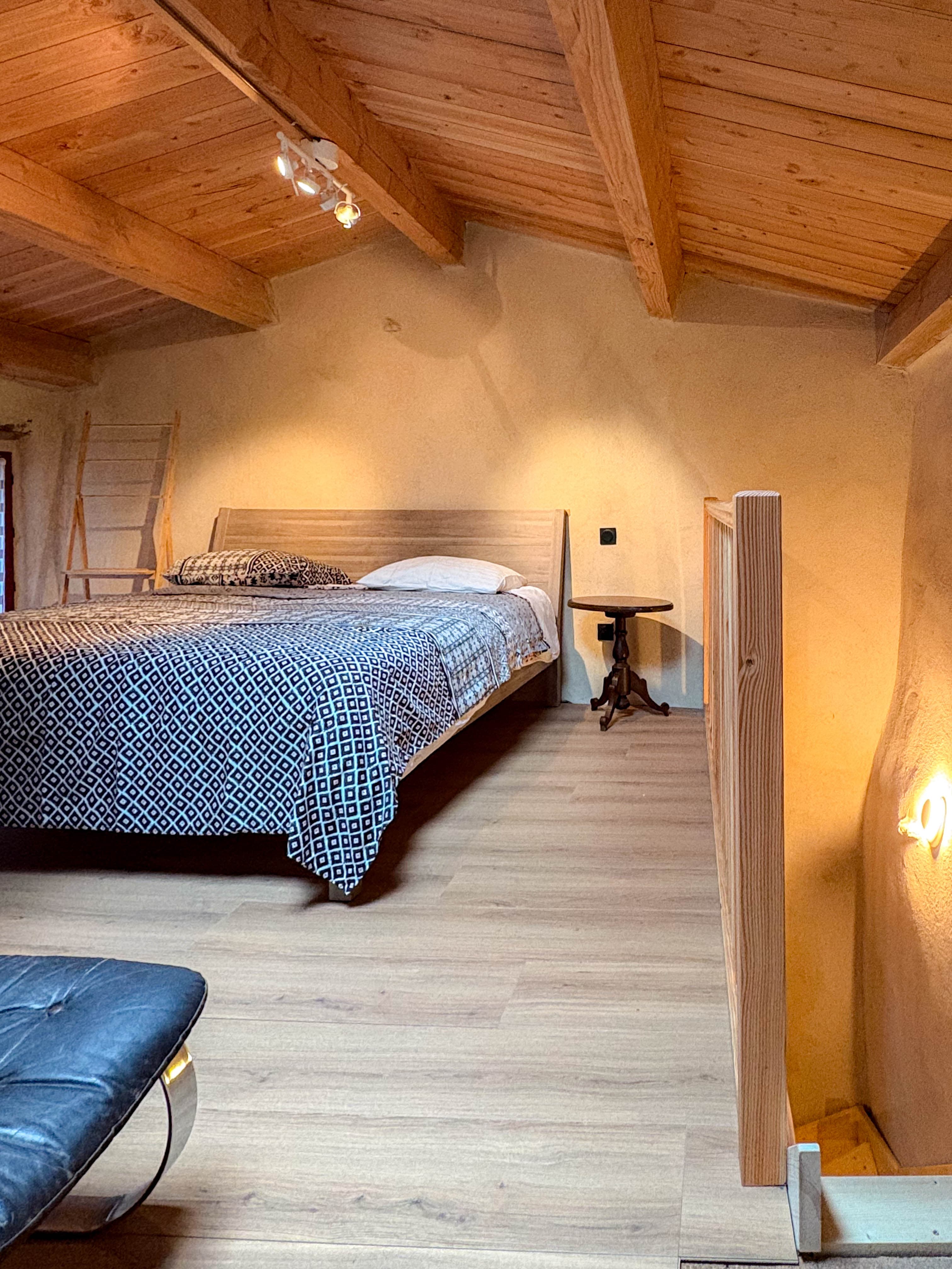 Bebop Studio bedroom with exposed beams